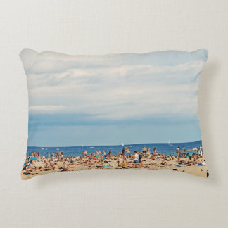 People on brown sand beach accent pillow