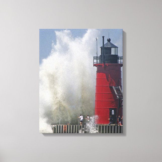 People on jetty watch large breaking waves in canvas print (Front)