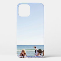 People on white sands by the beach