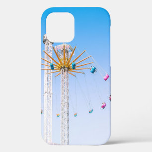 People riding swing amusement ride low-angle photo iPhone 12 case