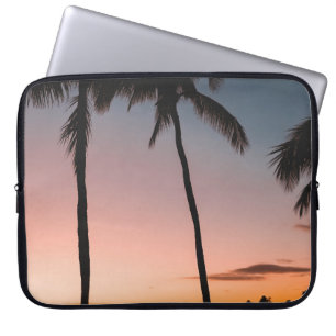 People sitting on beach near sea laptop sleeve