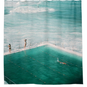 People standing and swimming on swimming pool besi