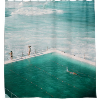 People standing and swimming on swimming pool besi