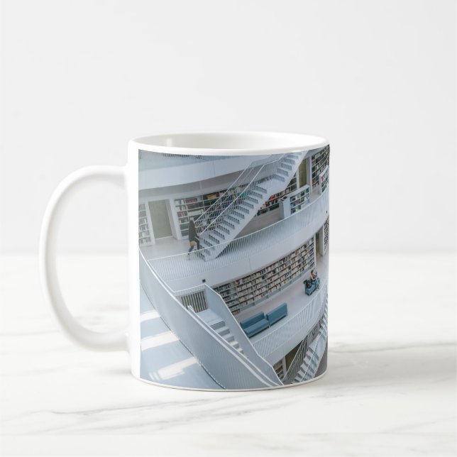 PEOPLE WALKING INSIDE LIBRARY COFFEE MUG (Left)