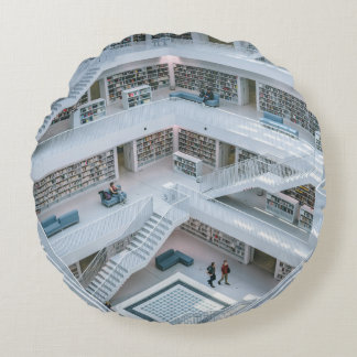 PEOPLE WALKING INSIDE LIBRARY ROUND PILLOW
