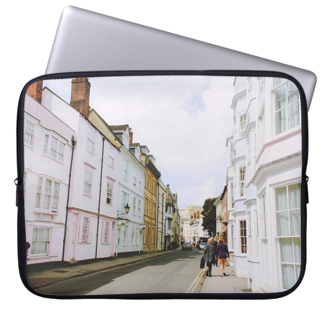 PEOPLE WALKING ON SIDEWALK BESIDE BUILDING AND ROA LAPTOP SLEEVE (Front)