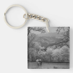 People with umbrellas keychain