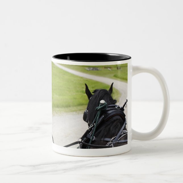 Perchon horses pulling cart  against historic Two-Tone coffee mug (Right)