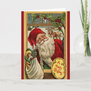 Père Noël à la fenêtre avec carte de voeux pour jo