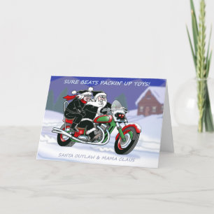 Père Noël Outlaw avec carte de Noël Mama Claus©