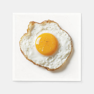 Perfectly Fried Egg with Crisp Edges and Golden Yo Napkin
