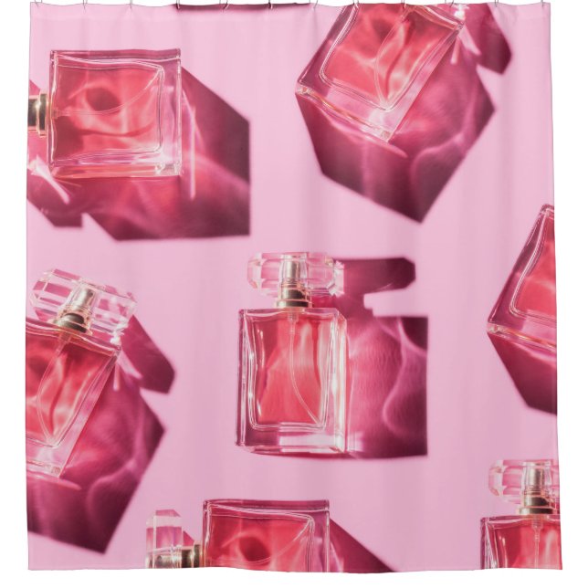 Perfume bottles, pink background, flatlay (Front)