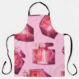 Perfume bottles, pink background, flatlay apron