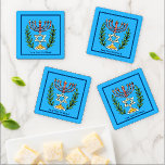 Persian Magen David Menorah Coaster Set<br><div class="desc">This image was adapted from an antique Persian Jewish tile and features a menorah with a Magen David (Star of David) framed by olive branches.  The imperfections of the original,  hand-painted image have been preserved. Add your own text.</div>