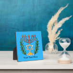 Persian Magen David Menorah Plaque<br><div class="desc">This image was adapted from an antique Persian Jewish tile and features a menorah with a Magen David (Star of David) framed by olive branches. The imperfections of the original, hand-painted image have been preserved. Add your own text and you may change the background colour.</div>