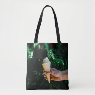 Person holding ice cream tote bag