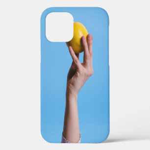 Person holding lemon iPhone 12 case