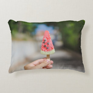 Person holding popsicle in the morning accent pillow