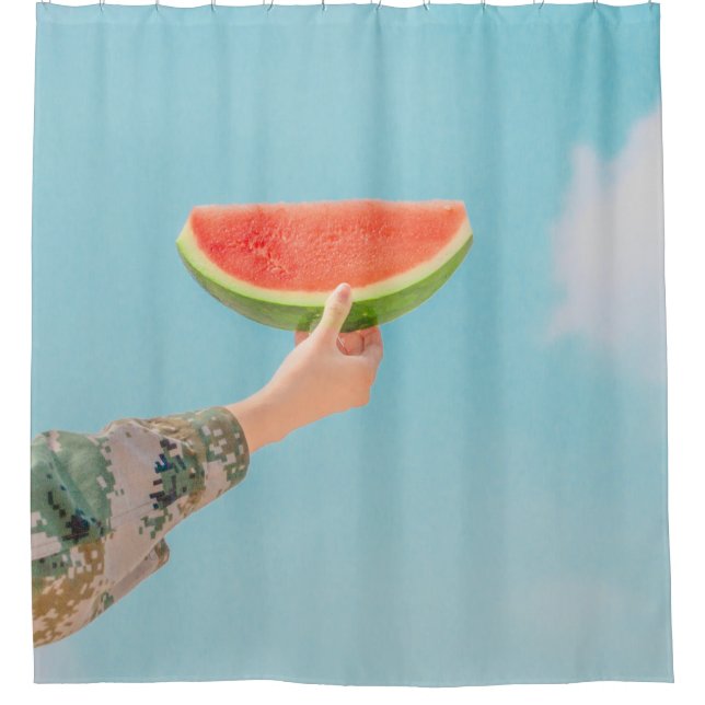 Person holding sliced watermelon (Front)