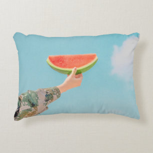 Person holding sliced watermelon accent pillow