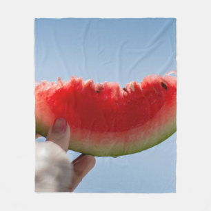 Person holding sliced watermelon fleece blanket