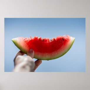 Person holding sliced watermelon poster