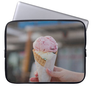 Person holding strawberry ice cream laptop sleeve