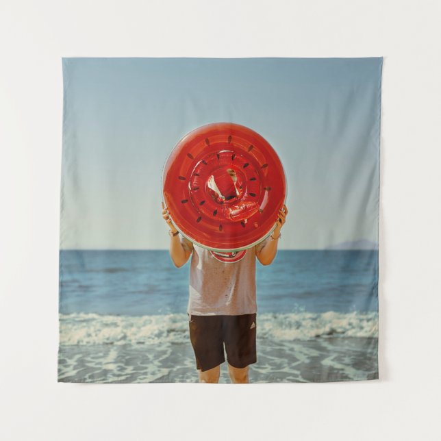 Person holding watermelon-themed inflatable ring tapestry (Front)