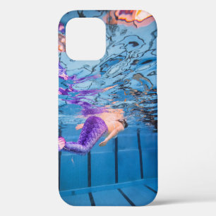 Person in purple pants lying on blue hammock iPhone 12 case