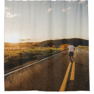 Person running in road in the morning