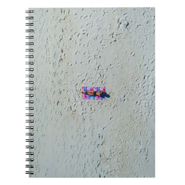 Person sunbathing at the beach notebook (Front)