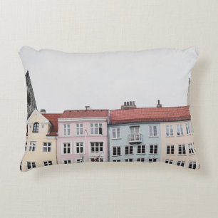 PERSON TAKING PICTURE OF STRUCTURES ACCENT PILLOW