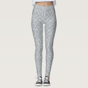 Person wearing black-and-white patterned leggings