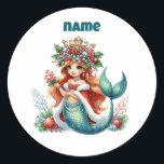 Personalised Christmas Mermaid Circular Sticker<br><div class="desc">Make your holiday season magical with this personalised Christmas mermaid sticker! Featuring a charming mermaid design in a circular style, this sticker can be customised with your child’s name or a special message. Perfect for decorating presents, notebooks, party favours, or adding a festive touch to any gift. Durable, vibrant, and...</div>