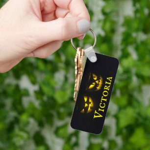 Personalised yellow on black creepy pumpkin faces keychain