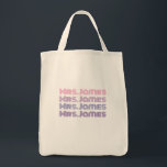 Personalizable wedding bride tote bag<br><div class="desc">easy to personalize!

let the world know your new name!

perfect gift for
honeymoon
wedding
engagement
bridal shower
newlywed 

change the name... .or use the design tool and make further changes to colour as desired</div>
