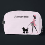 Personalize Woman in pink walking black poodle Dopp Kit<br><div class="desc">Personalize this woman in pink with a beret walking a black poodle and add a name.</div>