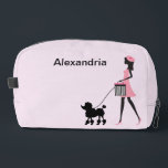 Personalize Woman in pink walking black poodle Dopp Kit<br><div class="desc">Personalize this woman in pink with a beret walking a black poodle and add a name.</div>