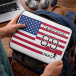 Personalized American Soccer Athlete Patriotic  Laptop Sleeve<br><div class="desc">Keep your computer secure and stylish with this custom laptop sleeve featuring a high-impact USA soccer design. This protective sleeve is padded to shield your tech from bumps and scratches, featuring a secure zippered top for daily use. The vibrant stars and stripes background is personalized with your custom name and...</div>
