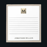 Personalized Beige Linen Gold Monogram Notepad<br><div class="desc">Stay organized in style with this personalized beige linen notepad featuring a sophisticated black and gold monogram design. The lined pages provide ample space for jotting down notes, to-do lists, and more, while the elegant design adds a touch of luxury to your everyday life. Perfect for personal use or as...</div>