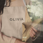 Personalized Beige Monogram Costume  Apron<br><div class="desc">Cook, bake, or grill in style with this personalized beige monogram apron costume! Featuring a clean and minimalistic monogram design on a neutral beige background, this apron combines functionality and elegance. Customize it with your initials or name to make it uniquely yours. Whether you're hosting a dinner party, preparing holiday...</div>