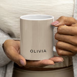 "Personalized Beige Monogram Custom Coffee Mug<br><div class="desc">Sip in style with this personalized beige monogram mug, designed to add a touch of elegance to your morning coffee or tea ritual. Featuring a minimalistic monogram design on a soft beige background, this mug is fully customizable with your initials or name. Crafted from durable ceramic, it’s perfect for everyday...</div>