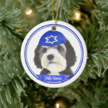 Personalized Bernedoodle Hanukkah Yarmulke Blue Ceramic Ornament<br><div class="desc">Celebrate your favourite mensch on a bench with personalized ornament! This design features a sweet illustration of a bernedoodle or sheepadoodle dog with a blue and white yarmulke. For the most thoughtful gifts, pair it with another item from my collection! To see more work and learn about this artist, visit...</div>