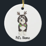 Personalized Bernedoodle Reindeer Bowtie Christmas Ceramic Ornament<br><div class="desc">I am in love with this beautifully detailed watercolor illustration of a grey, black, and white bernedoodle or sheepadoodle on an ornament with a sweet little antler and red & green bowtie combo! Personalize these ornaments and make the nice list this year! For the perfect presents, pair it with a...</div>
