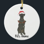 Personalized Black Great Dane Christmas Ceramic Ornament<br><div class="desc">Make the nice list this year with a personalized Christmas ornament of your favorite little black great dane elf in a santa hat and red and green holly wreath! For the sweetest gifts,  pair it with a matching art print or another item from my black great dane collection!</div>