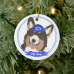 Personalized Black Headed Tricolor Corgi Hanukkah Ceramic Ornament<br><div class="desc">Celebrate your favourite mensch on a bench with personalized ornament! This design features a sweet illustration of a black headed tricolor corgi dog with a blue and white yarmulke. For the most thoughtful gifts, pair it with another item from my collection! To see more work and learn about this artist,...</div>