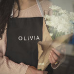 Personalized Black & Name Monogram | Elegant  Apron<br><div class="desc">Cook, bake, or grill in style with this elegant personalized apron, featuring a sleek black background and a customizable name monogram. Perfect for home chefs, bakers, or BBQ enthusiasts, this apron combines functionality and sophistication. Made with durable fabric and adjustable straps, it provides comfort and protection while you whip up...</div>
