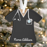 Personalized Black Nurse Scrubs Ornament<br><div class="desc">Show appreciation for a dedicated nurse with this personalized black nurse scrubs ornament, featuring detailed stethoscope and badge accents. This ornament is a thoughtful gift for holiday décor, nurse graduations, or new job celebrations, honouring the hard work of healthcare professionals. Add a name to create a unique keepsake that makes...</div>