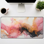 Personalized Black Pink Gold Liquid Alcohol Ink Desk Mat<br><div class="desc">Unveiling our Personalized Black, Pink, and Gold Liquid Waves Mat. This captivating design showcases an abstract pattern of fluid waves in an elegant harmony of black, pink, and gold tones. The striking contrast creates a luxurious feel, while the personalized feature adds a unique touch to this design. This radiant piece...</div>