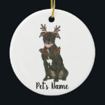 Personalized Black Pitbull Staffy Antlers Wreath Ceramic Ornament<br><div class="desc">Make the nice list this year with an ornament of your favourite pitbull elf! For the sweetest gifts, pair it with a matching art print or another item from my collection for a thoughtful housewarming, bridal shower, teacher, mother-in-law, husband, boyfriend, secret santa, sympathy, or tough-to-shop-for gift! To see more work...</div>